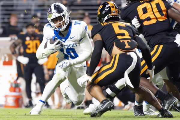 Kentucky Wildcats running back Jamarion Wilcox (10) runs at the Tennessee defense during the Kentucky vs. Tennessee football game on Saturday, Nov. 2, 2024, at Neyland Stadium in Knoxville, Tennessee. Kentucky lost 28-18. Photo by Christian Kantosky | Staff