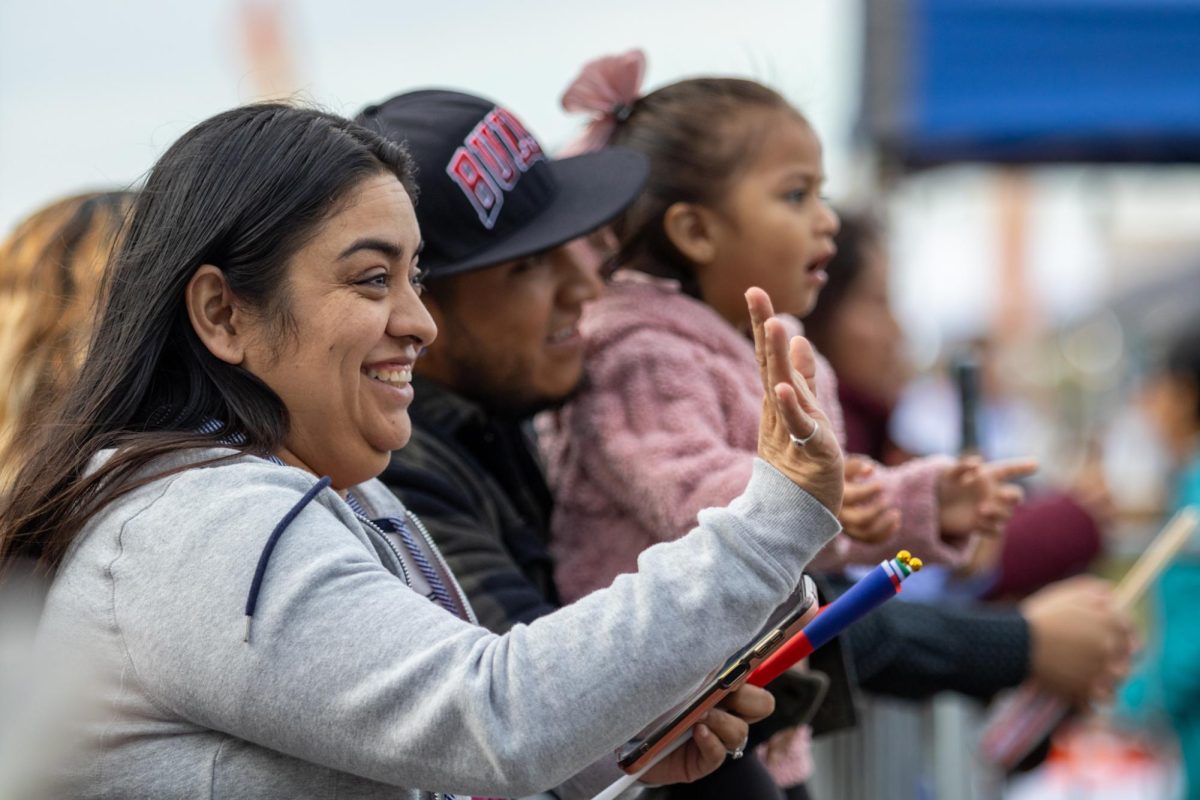 Festival attendees watch performances from Mary Todd Elementary on Saturday, Nov. 9, 2024, at the Festival Latino de Lexington in Lexington, Kentucky. Photo by Sydney Novack | Staff