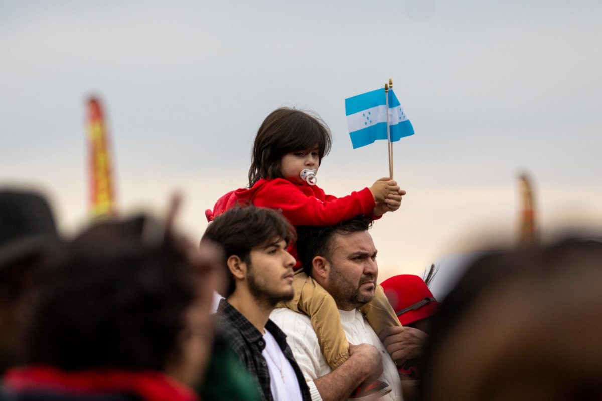 Festival attendees watch performances on Saturday, Nov. 9, 2024, at the Festival Latino de Lexington in Lexington, Kentucky. Photo by Sydney Novack | Staff