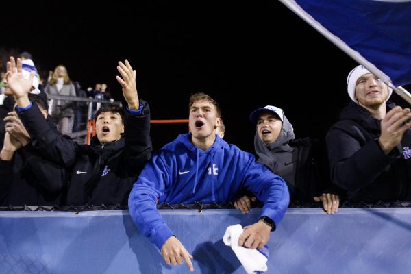 Fans cheer as the Kentucky Goalkeeper saves a penalty in extra time of the Kentucky vs. WVU soccer match on Friday, Nov. 15, 2024, at the Wendell and Vickie Bell Soccer Complex in Lexington, Kentucky. Kentucky won 4-2 in penalties in the first round of the NCAA Women’s Soccer Championship. Photo by Christian Kantosky | Staff