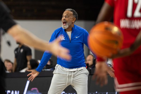 Kentukcy Wildcats head coach Kenny Brooks yells during the Kentucky vs. Louisville women’s basketball game on Saturday, Nov. 16, 2024, at Historical Memorial Coliseum in Lexington, Kentucky. Kentucky won 71—61. Photo by Sydney Yonker | Staff