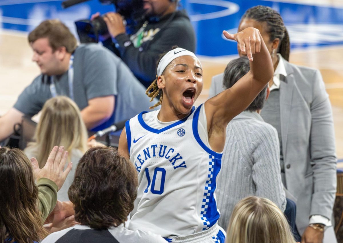 Kentucky Wildcats guard, Dazia Lawrence (10), high-fives the crowd while celebrating a win over Louisville after the Kentucky vs. Louisville women's basketball game on Saturday, Nov. 16, 2024, at Historical Memorial Coliseum in Lexington, Kentucky. Kentucky won 71-61. Photo by Nathan Jones. | Staff