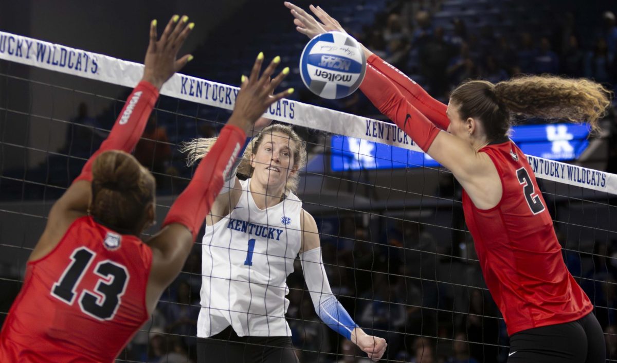 Kentucky Wildcats outside hitter Megan Wilson (1) spikes the ball over the net during the Kentucky vs. Georgia volleyball match on Sunday, Nov. 17, 2024, at Historic Memorial Coliseum in Lexington, Kentucky. Kentucky won 3-1. Photo by Christian Kantosky | Staff