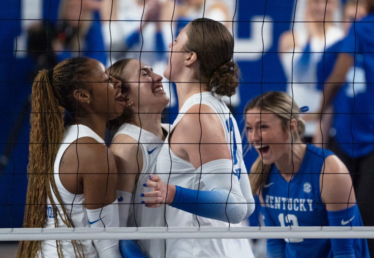 Kentucky Wildcats celebrate after a point during the Kentucky vs. Georgia volleyball match on Sunday, Nov. 17, 2024, at Historic Memorial Coliseum in Lexington, Kentucky. Kentucky won 3-1. Photo by Mateo Smith Villafranco | Staff