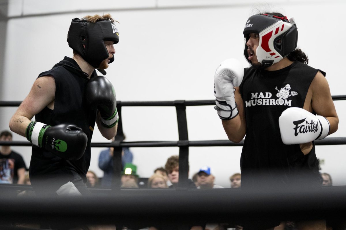 Hunter Williams and Adam Speridakos face off during the UK Boxing Club exhibition match on Saturday, Nov. 23, 2024, at Thrive Tribe Boxing and Fitness in Lexington, Kentucky. Photo by Christian Kantosky | Assistant Photo Editor