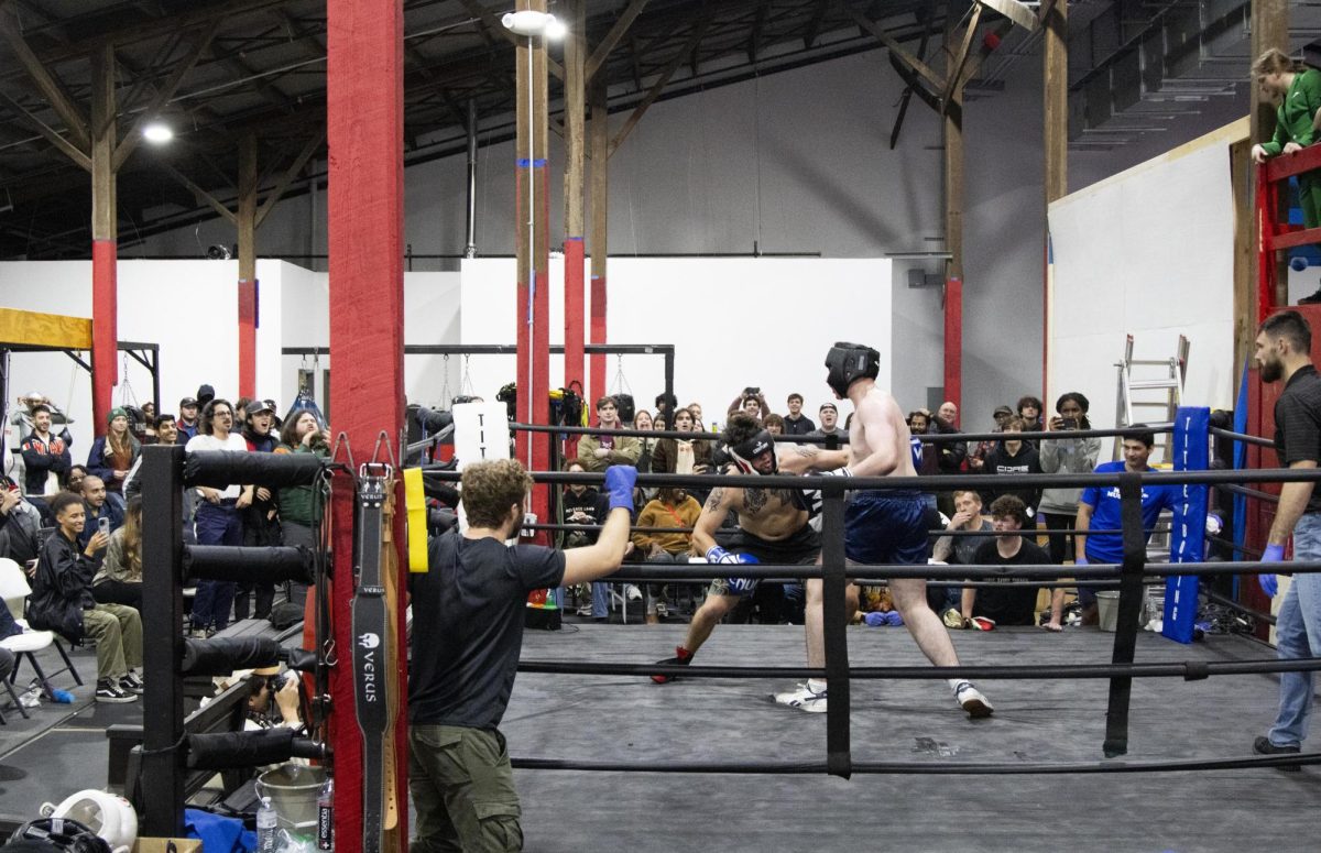 Declan Ochoa ducks to avoid Aidan Greenwell’s punch during the UK Boxing Club exhibition match on Saturday, Nov. 23, 2024, at Thrive Tribe Boxing and Fitness in Lexington, Kentucky. Photo by Christian Kantosky | Assistant Photo Editor