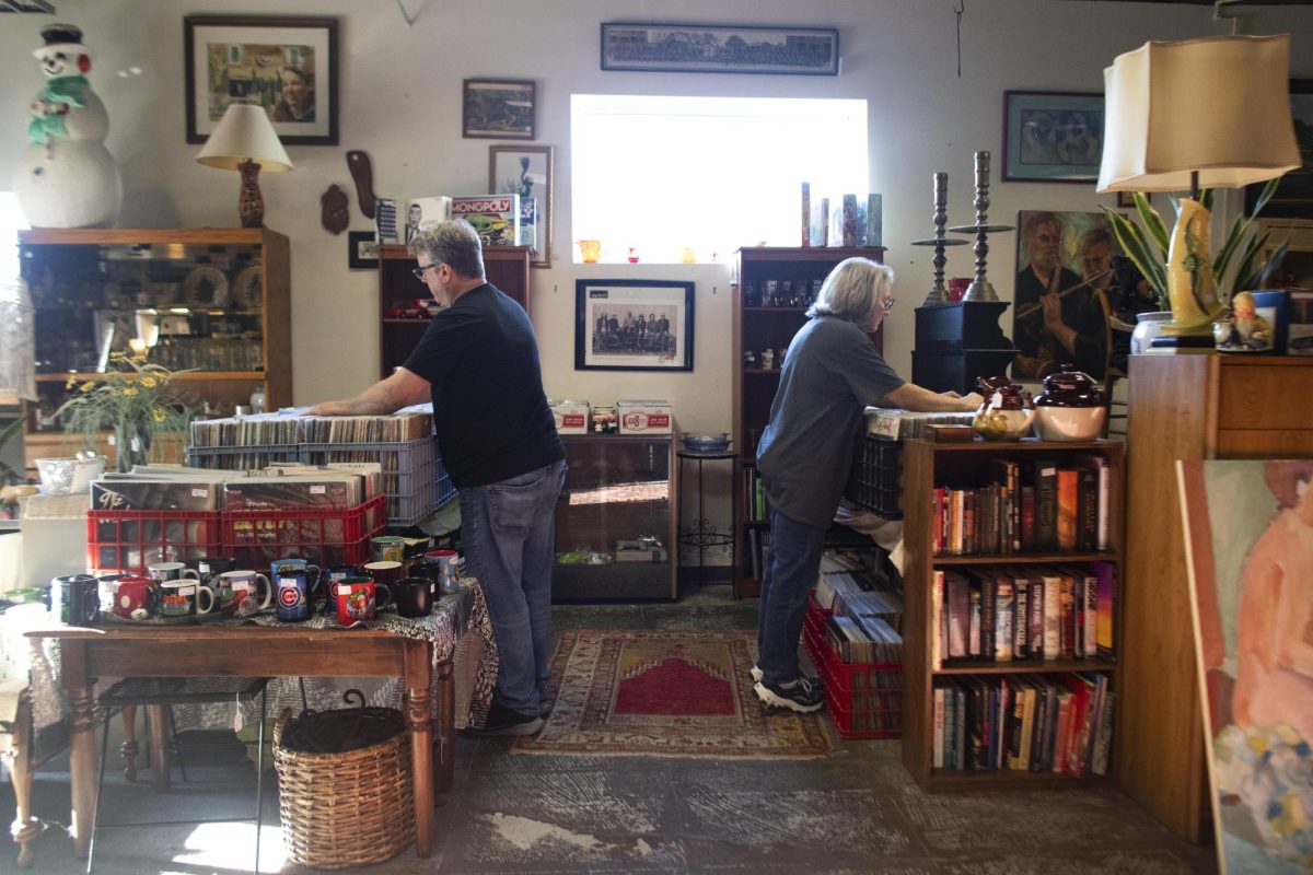 A couple looks through old vinyls on Sunday, Nov. 24, 2024, at The Domestic in Lexington, Kentucky. Photo by Christian Kantosky | Assistant Photo Editor