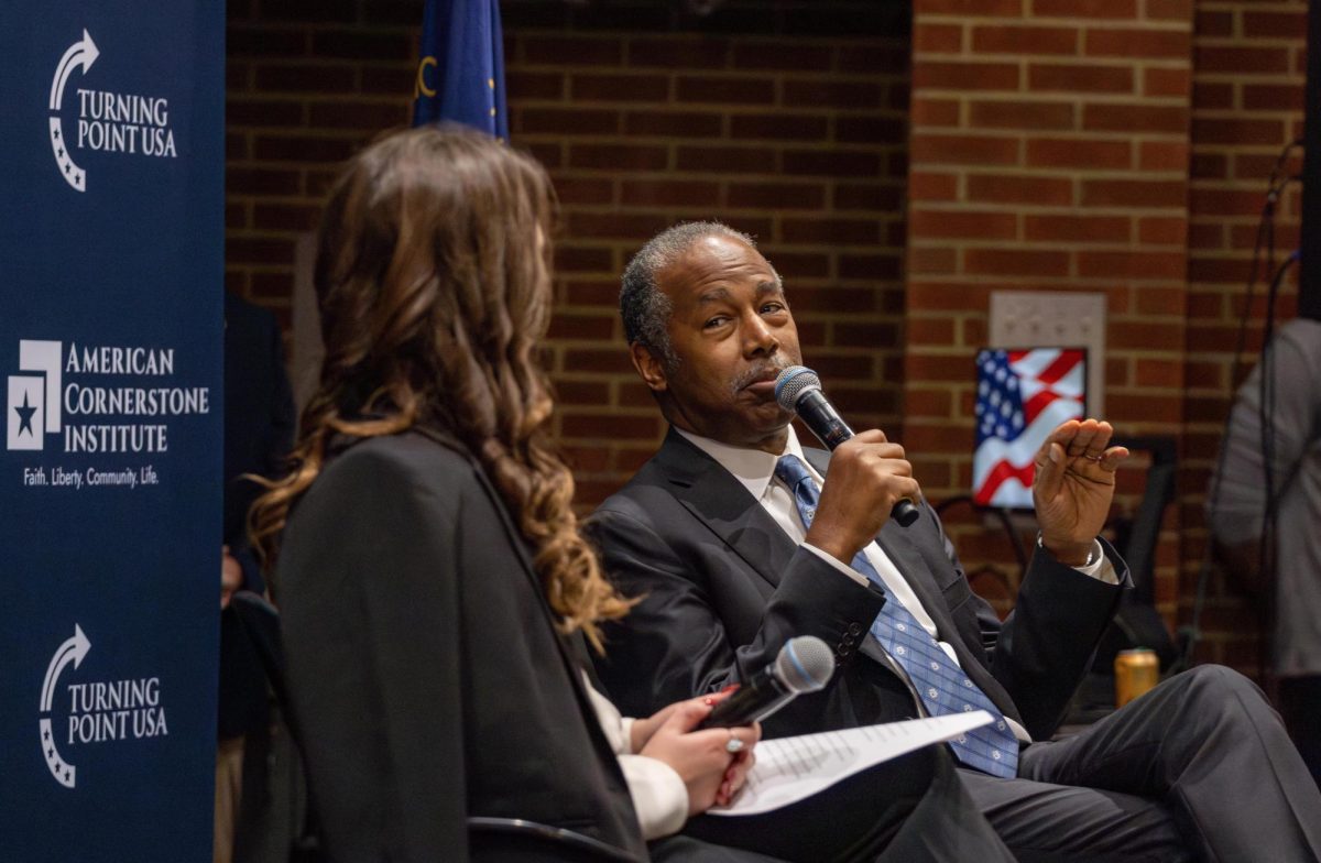 Dr. Ben Carson answers questions asked by the Kentucky Turning Point USA President Emma McDaniel on Wednesday, Nov. 20, 2024, at the University of Kentucky’s College of Nursing in Lexington, Kentucky. Photo by Nathan Jones | Staff