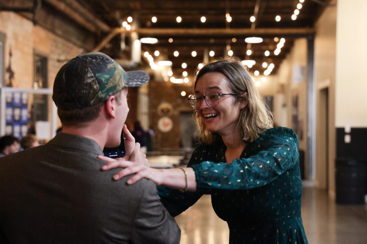 Emma Lee Curtis reacts to winning Lexington Fayette Urban County Council District 4 at the Team Fayette and the Fayette County Young Democrats Election Night Watch Party on Tuesday, Nov. 5, 2024, at Greyline Station in Lexington, Kentucky. Curtis is the first openly transgender woman on the county council. photo by Abbey Cutrer | Staff