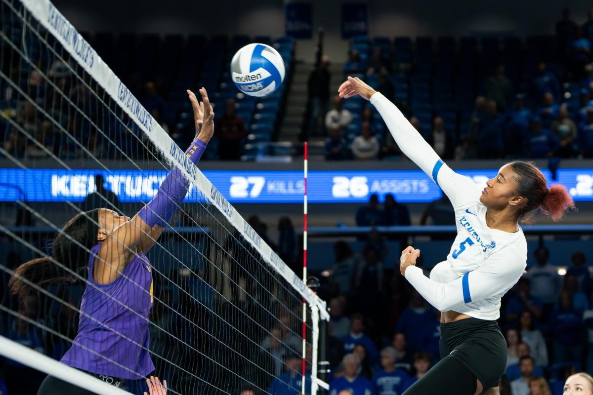 Kentucky volleyball middle blocker Jordyn Dailey (5) spikes the ball during the match between Kentucky and LSU on Sunday, Nov. 10, 2024, at Historic Memorial Coliseum in Lexington, Kentucky. Kentucky won 3-0. Photo by Will Luckett | Staff