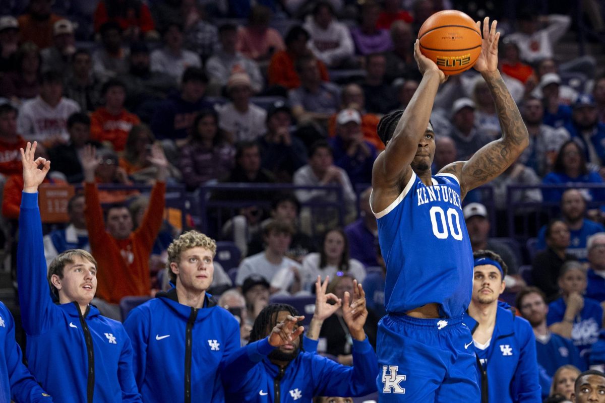 Kentucky Wildcats guard Otega Oweh (00) takes a three-point shot attempt during the basketball game vs. Clemson on Tuesday, Dec. 3, 2024, at Littlejohn Coliseum in Clemson , South Carolina . Kentucky lost 70-66. Photo by Matthew Mueller | Photo Editor