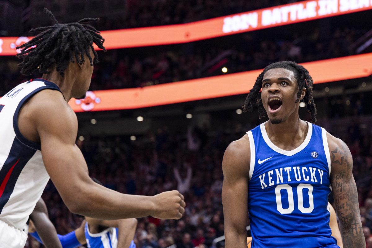 Kentucky Wildcats guard Otega Oweh (00) screams at Gonzaga Bulldogs guard Michael Ajayi (1) after making a shot over him during the basketball game vs. Gonzaga on Sunday, Dec. 8, 2024, at Climate Pledge Arena in Seattle, Washington.  Kentucky won 90-89. Photo by Matthew Mueller | Photo Editor