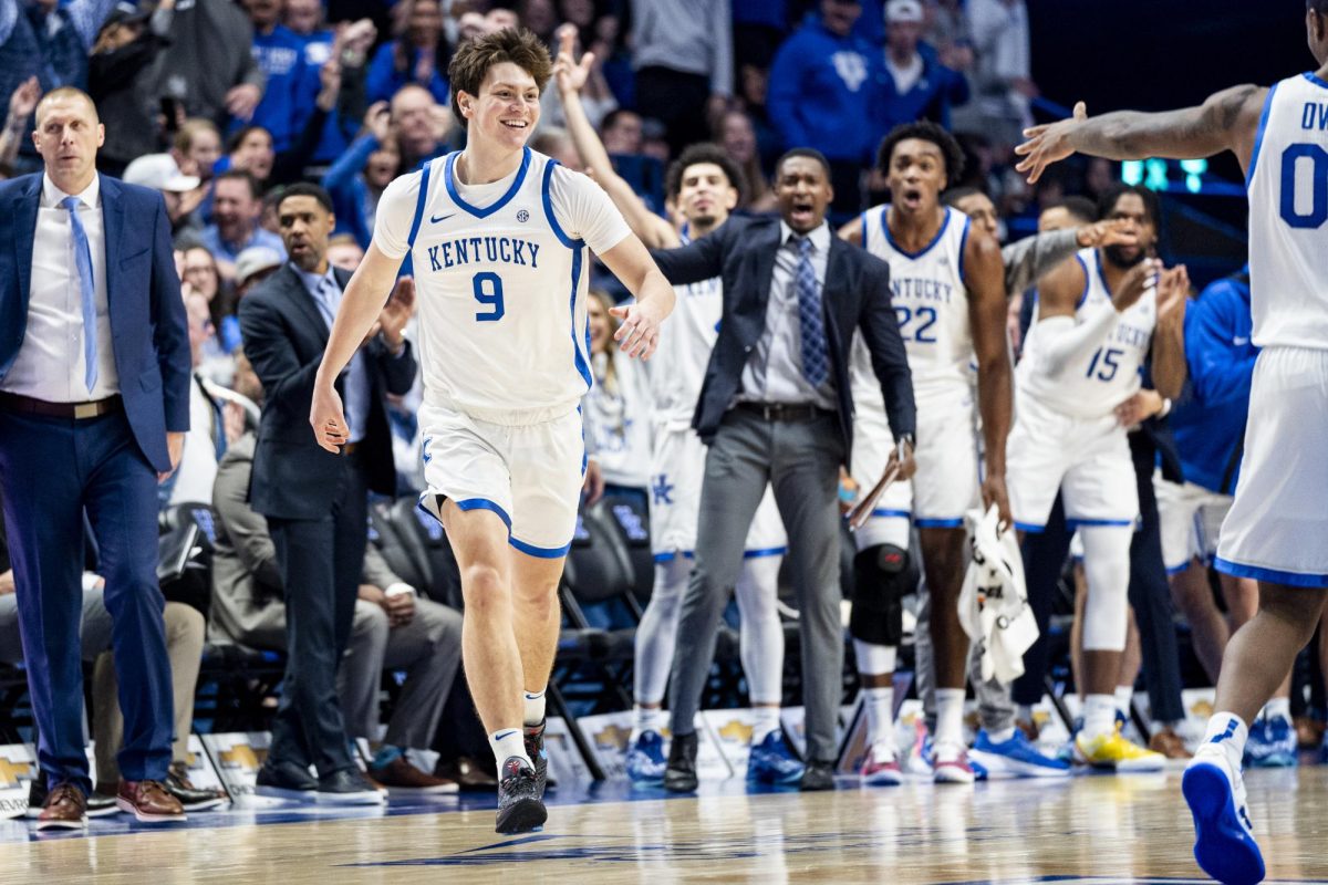 Kentucky Wildcats forward Trent Noah (9) smiles after making a three-point shot during the basketball game vs. Colgate on Wednesday, Dec. 11, 2024, at Rupp Arena in Lexington, Kentucky. Kentucky won 78-67. Photo by Matthew Mueller | Photo Editor