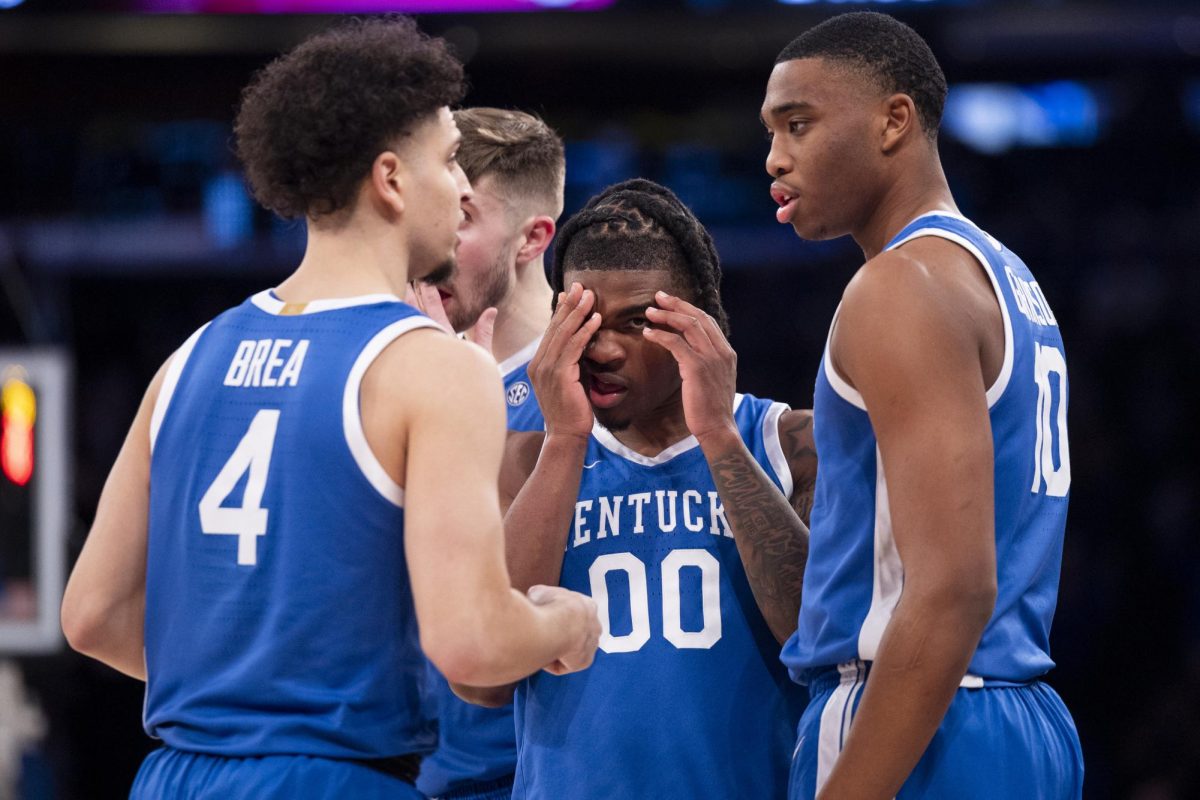 Kentucky Wildcats guard Otega Oweh (0) holds his head after he was hit during a shot attempt during the basketball game vs. Ohio State on Saturday, Dec. 21, 2024, at Madison Square Garden in New York City, Kentucky lost 85-65. Photo by Matthew Mueller | Photo Editor