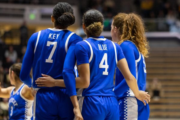 Kentucky Wildcats forward Teonni Key (7), guard Lexi Blue (4), and forward Amelia Hassett (32) listen for the next play during the Kentucky vs Purdue women’s basketball on Saturday, Dec. 14, 2024, at Mackey Arena in West Lafayette, Indiana. Kentucky won 82-52. Photo by Sydney Yonker | Staff