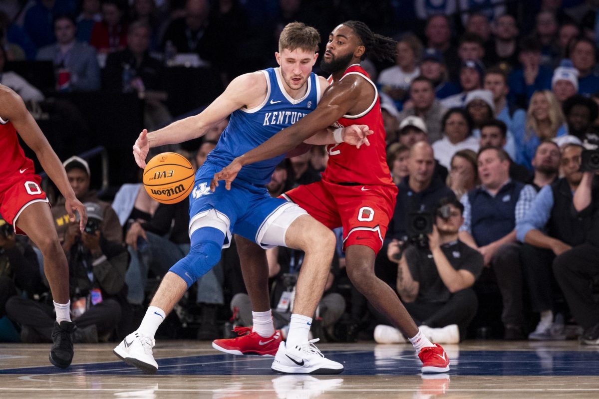 Kentucky Wildcats forward Andrew Carr (7) tries to backdown a defender during the basketball game vs. Ohio State on Saturday, Dec. 21, 2024, at Madison Square Garden in New York City, Photo by Matthew Mueller | Photo Editor