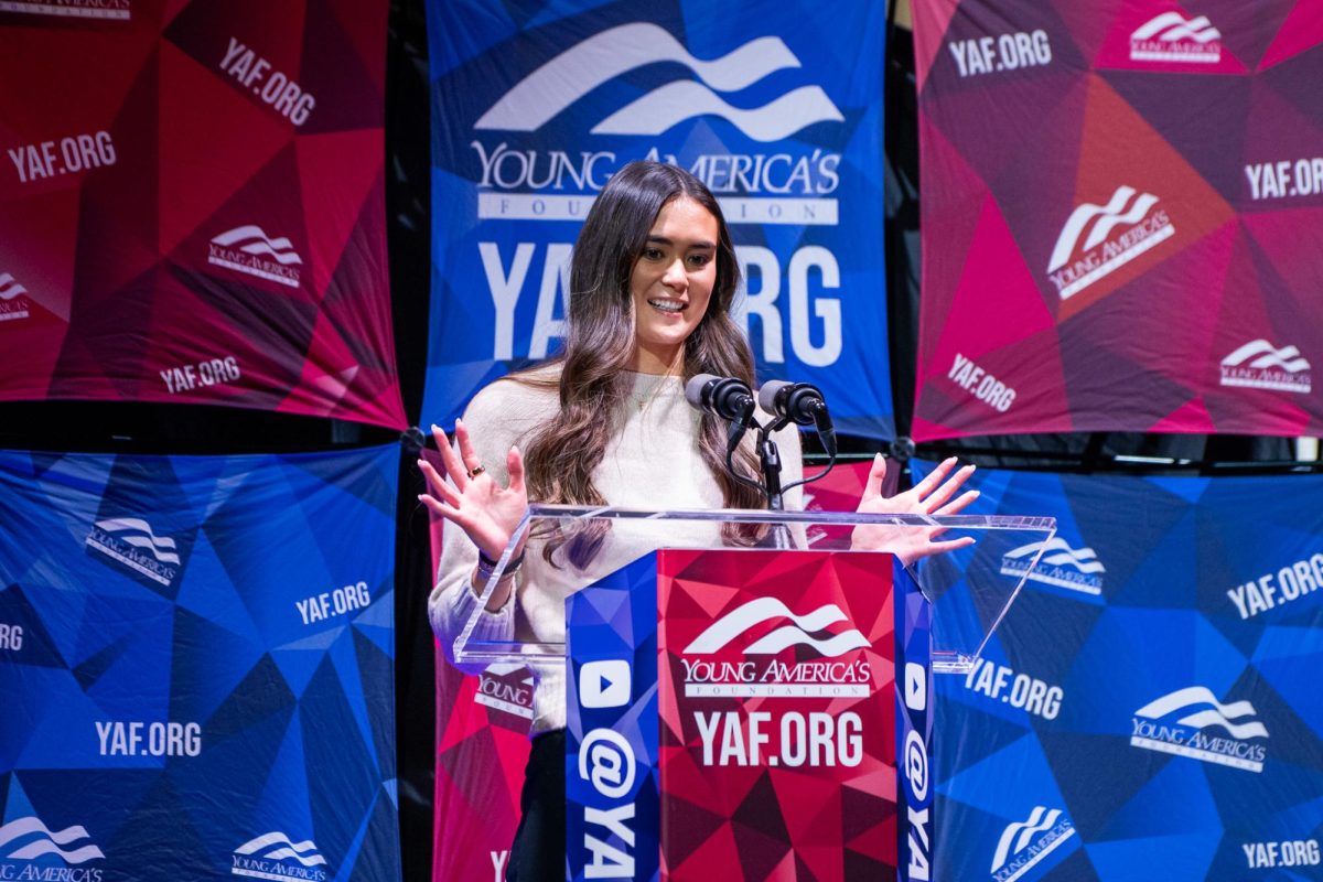 Paula Scanlan takes the stage during the Young Americans for Freedom event held at the Gatton Student Center on Thursday, Dec. 5, 2024. Photo by Will Luckett | Staff