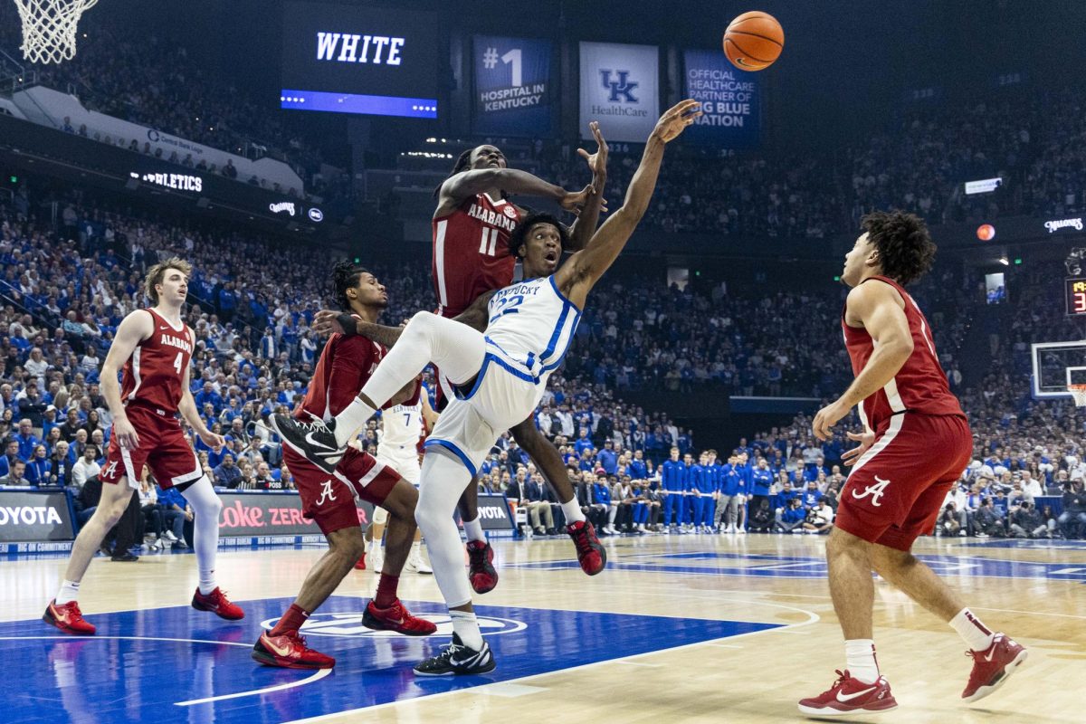 Kentucky Wildcats center Amari Williams (22) reaches for a rebound during the first half of the basketball game vs. Alabama on Saturday, Jan. 18, 2025, at Rupp Arena in Lexington. Photo by Matthew Mueller | Photo Editor