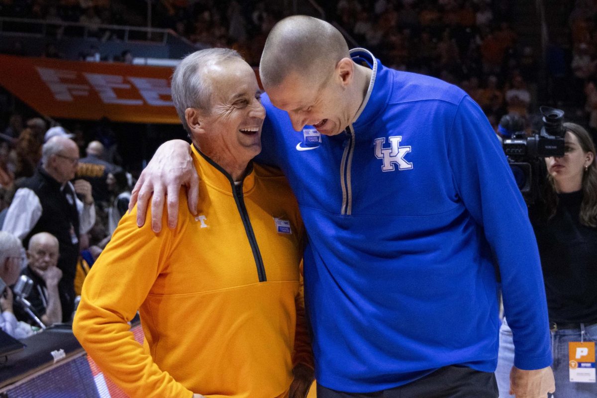 Kentucky Wildcats head coach Mark Pope and Tennessee Volunteers head coach Rick Barnes shake hands and greet each other at mid-court before the basketball game vs. Tennessee Tuesday, Jan. 28, 2025, at the Thompson–Boling Arena in Knoxville, Tennessee. Kentucky won 78-73. Photo by Matthew Mueller | Photo Editor