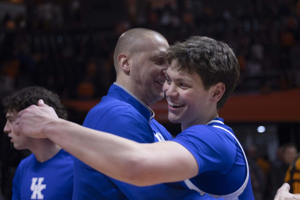 Kentucky Wildcats head coach Mark Pope hugs Kentucky Wildcats forward Trent Noah (9) after they defeated the Tennessee Volunteers during the basketball game vs. Tennessee Tuesday, Jan. 28, 2025, at the Thompson–Boling Arena in Knoxville, Tennessee. Kentucky won 78-73. Photo by Matthew Mueller | Photo Editor