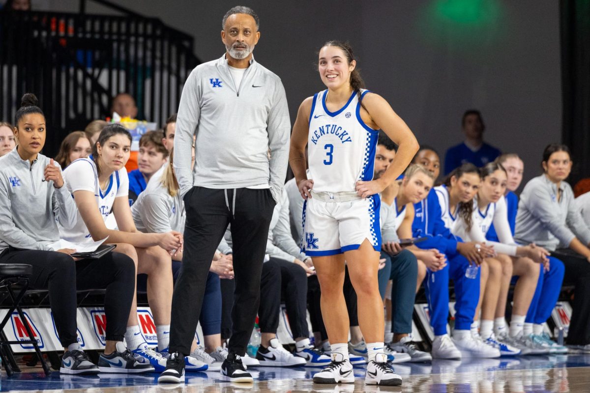 Kentucky Wildcats head coach Kenny Brooks and guard Georgia Amoore (3) watch free throws during the Kentucky vs. Miss. St. women’s basketball game on Thursday, Jan. 2, 2025, at Historic Memorial Coliseum in Lexington, Kentucky. Kentucky won 91-69. Photo by Sydney Yonker | Staff