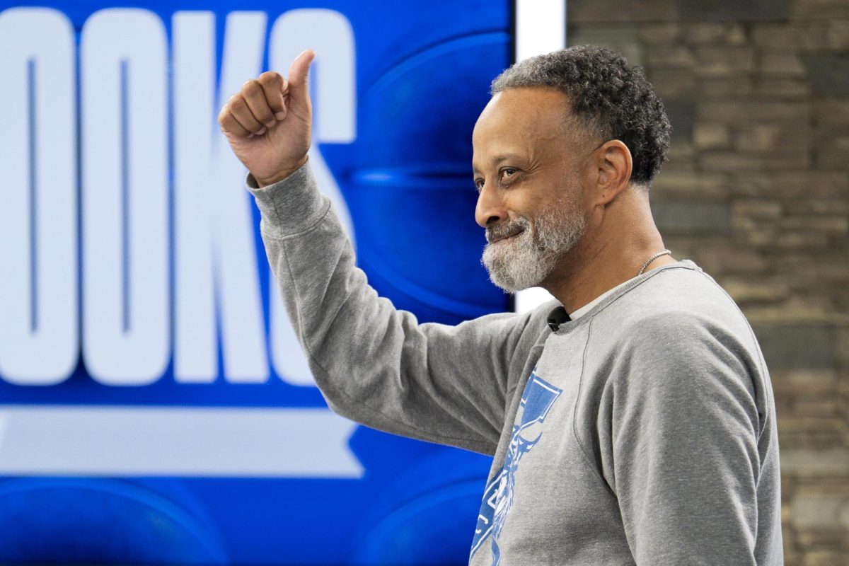 Kentucky women’s basketball coach Kenny Brooks greats the studio as he walk on set on Monday, Jan. 20, 2025, at Central Bank Center in Lexington, Kentucky. Photo by Christian Kantosky | Assistant Photo Editor