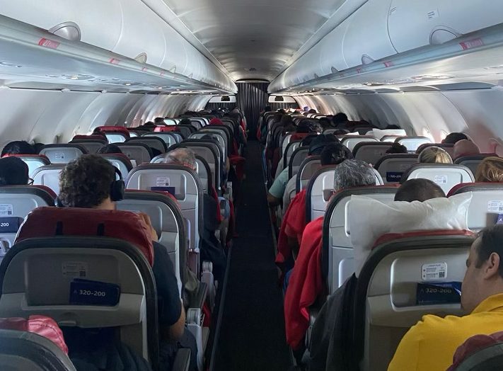 People sit inside and wait for a plane to take off. Photo provided by Quézia Arruda Cunha.