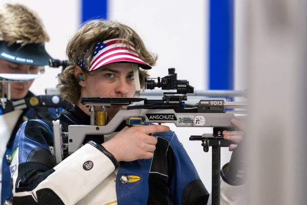 West Virginia University senior Gavin Barnick aims at the target during the Kentucky vs. West Virginia rifle match on Saturday, Feb. 8, 2025, at Baker Hall in Lexington, Kentucky. Kentucky lost 4749 to 4716. Photo by Sydney Novack | Staff