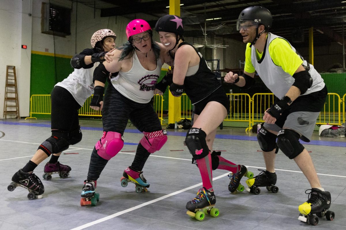 ROCK blockers try to block the jammer from getting through during roller derby practice on Sunday, Feb. 2, 2025, at The Yard in Lexington, Kentucky. Photo by Sydney Yonker | Staff