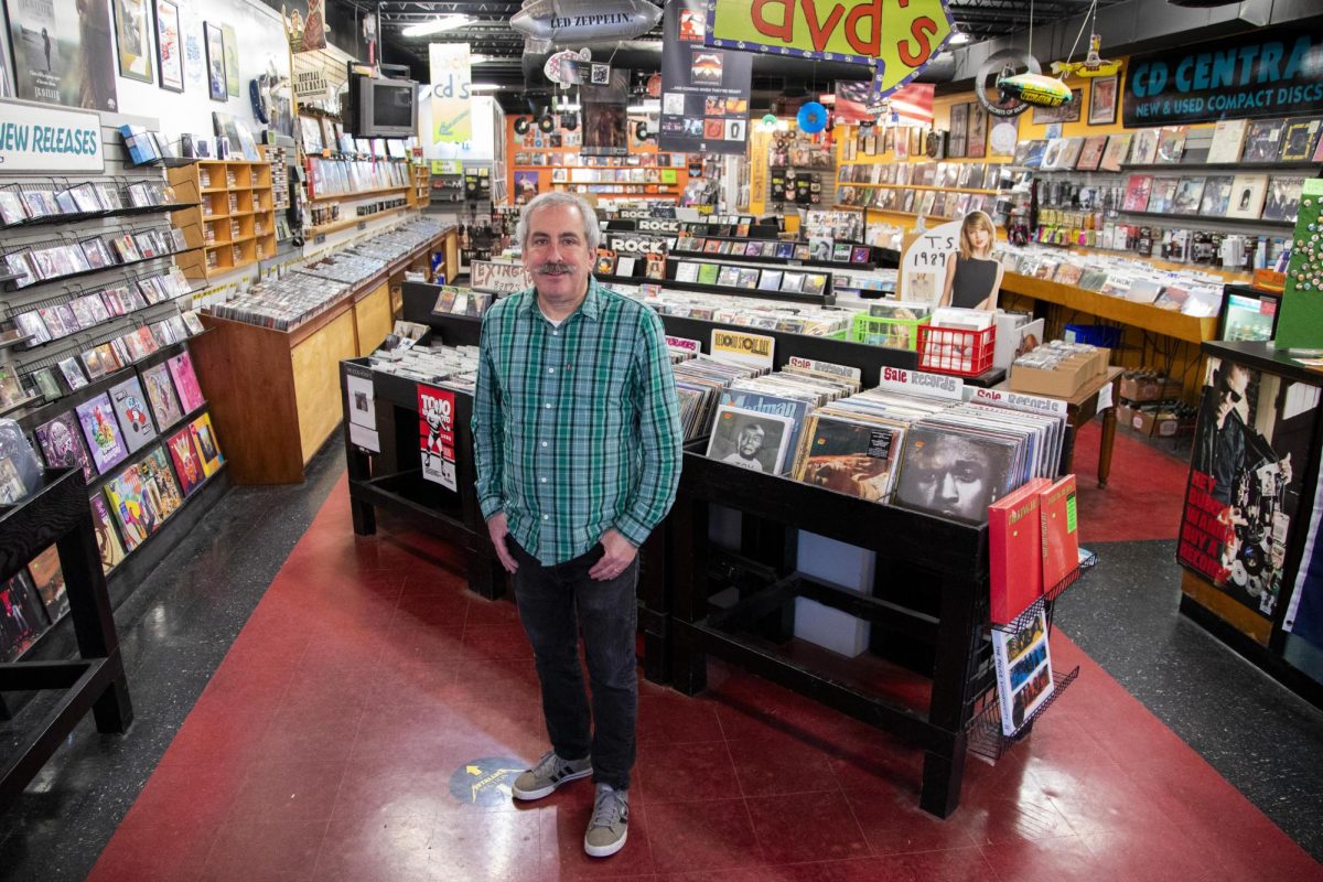 Steve Baron, owner and manager of CD Central poses for a portrait on Thursday, Feb. 13, 2025, at CD Central in Lexington, Kentucky. Photo by Christian Kantosky | Assistant Photo Editor