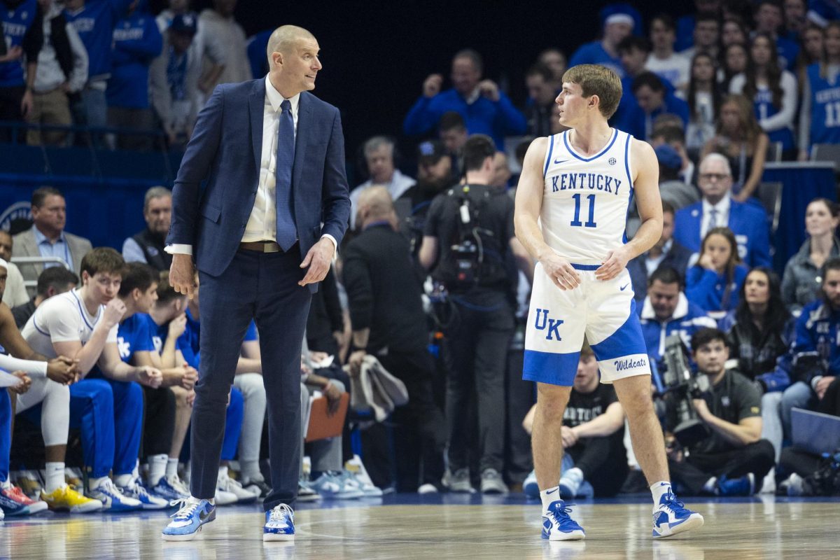 Kentucky Wildcats head coach Mark Pope speaks to Kentucky Wildcats guard Travis Perry (11) after a timeout during the first half of the basketball game vs. Arkansas on Saturday, Feb. 1, 2025, at Rupp Arena in Lexington, Kentucky. Photo by Matthew Mueller | Photo Editor