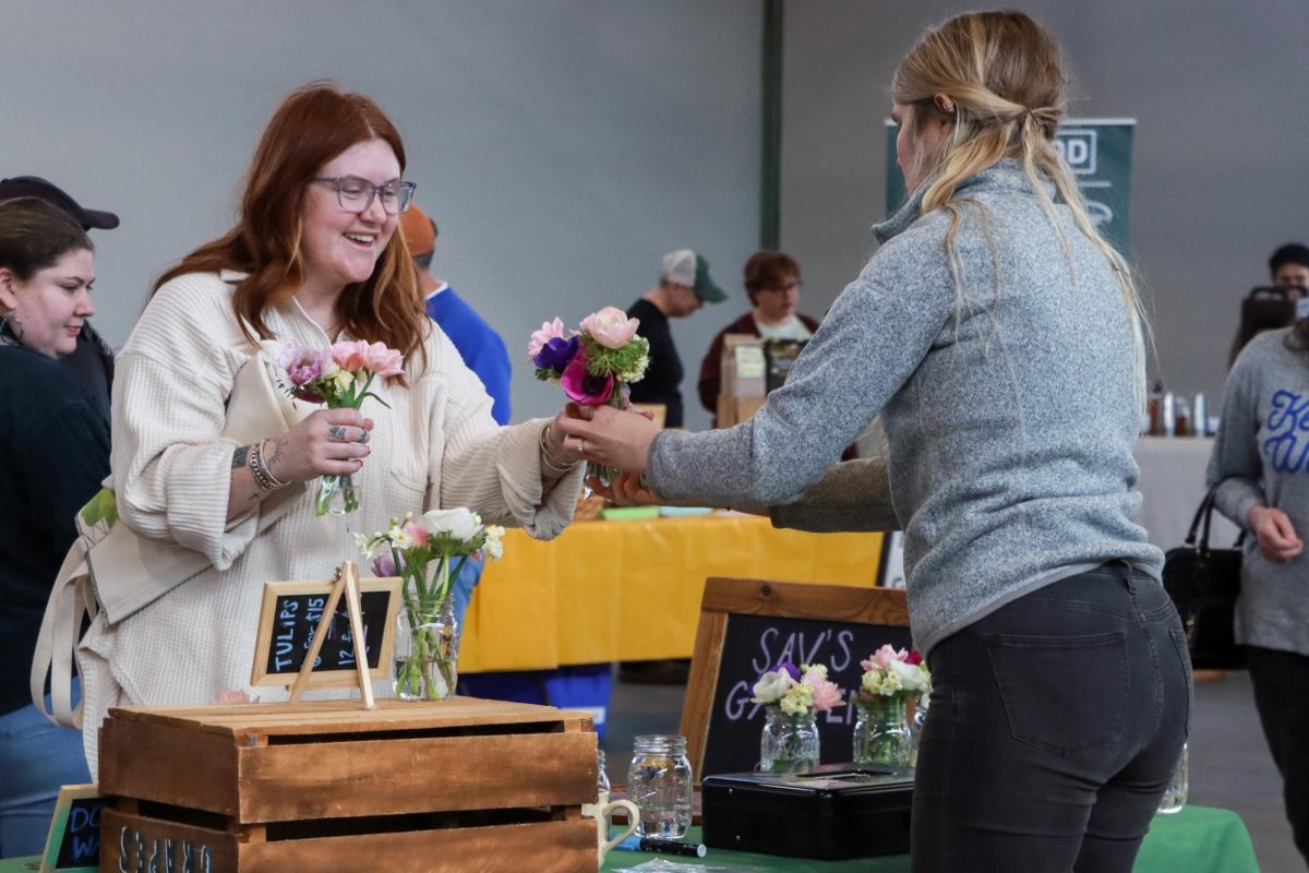 Sav's Garden owner Savannah McGuire sells her cut flowers during the Lexington Farmers Market on at Greyline Station Saturday March 8, 2025 in Lexington, Kentucky. Photo by Cara Raiford | Staff