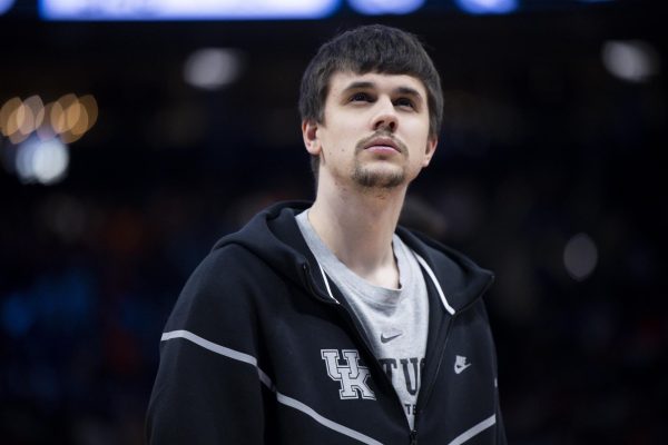 Kentucky Wildcats guard Kerr Kriisa (77) watches as his team walks onto the court during the second round of the NCAA men’s basketball tournament vs. the Illinois Fighting Illini on Sunday, March 23, 2025, at Fiserv Forum in Milwaukee, Wisconsin. Photo by Christian Kantosky | Assistant Photo Editor