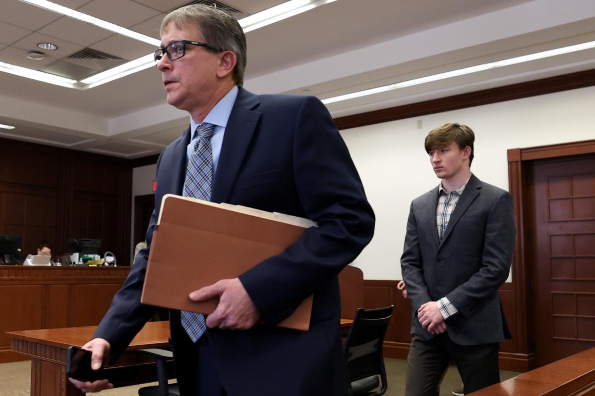 Addison Adkins walks out of his arraignment with Mike Roland, his defense attorney, on Tuesday, March 4, 2025, at the Robert F. Stephens District Courthouse in Lexington, Kentucky. Adkins is facing charges of rape in the first-degree and strangulation in the second-degree. Photo by Christian Kantosky | Assistant Photo Editor