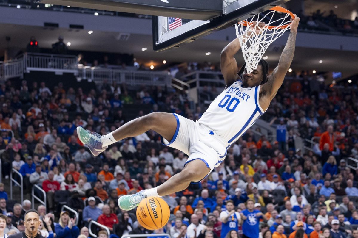 Kentucky Wildcats guard Otega Oweh (00) dunks the ball xduring the first round of the NCAA men’s basketball tournament vs. the Troy Trojans on Friday, March, 21, 2025, at Fiserv Forum in Milwaukee, Wisconsin. Kentucky won 76-57. Photo by Matthew Mueller | Photo Editor