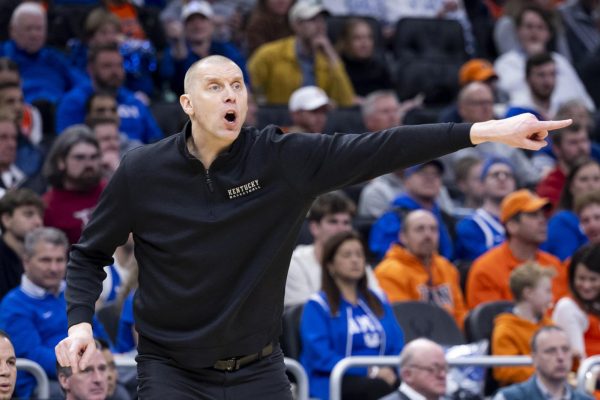 Kentucky Wildcats head coach Mark Pope yells out coaching calls during the first round of the NCAA men’s basketball tournament vs. the Troy Trojans on Friday, March, 21, 2025, at Fiserv Forum in Milwaukee, Wisconsin. Kentucky won 76-57. Photo by Matthew Mueller | Photo Editor