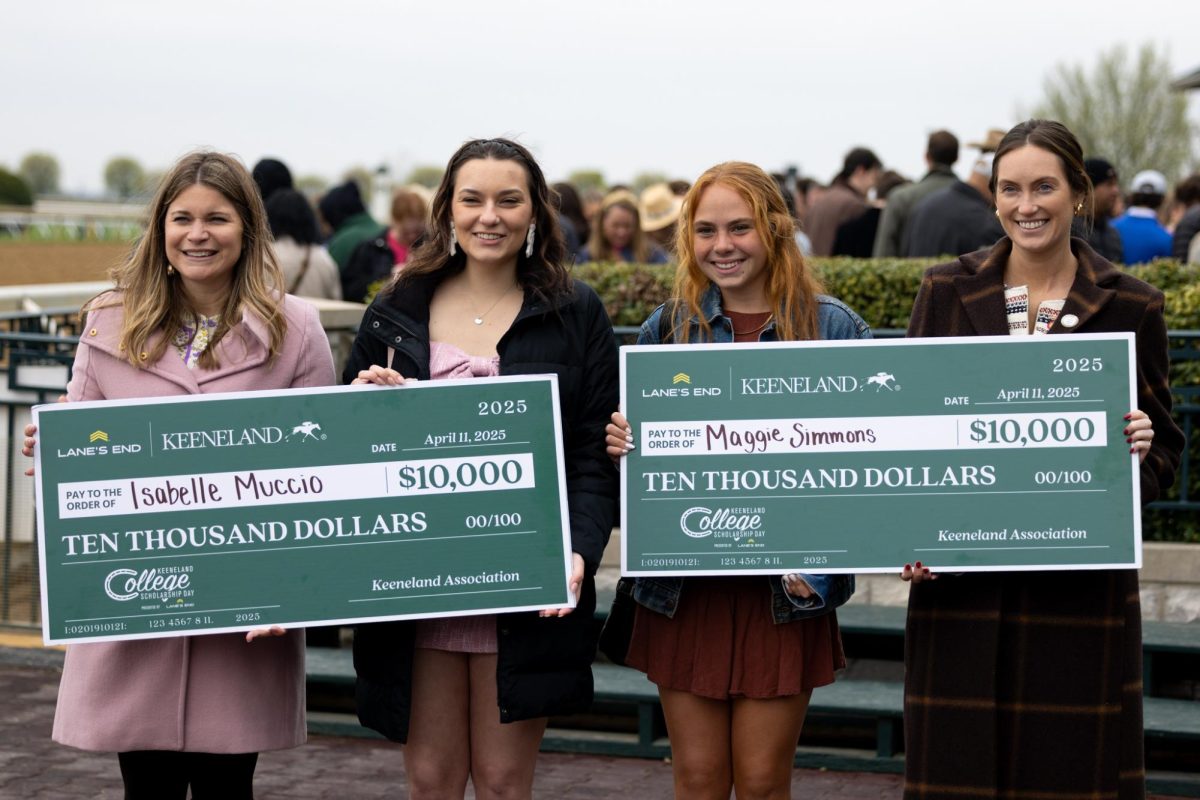 Students, Isabelle Muccio and Maggie Simmons, center, receive scholarships during Keeneland college scholarship day on Friday, April 11, 2025, at Keeneland Racetrack in Lexington, Kentucky. Photo by Sydney Yonker | Staff