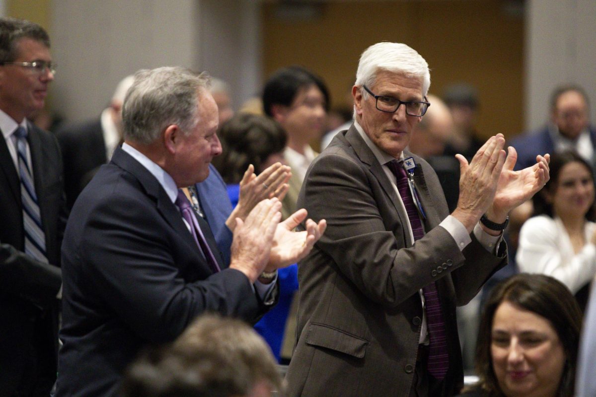 Attendees celebrate the professors who were highlighted during the board of trustees meeting on Friday, April 25, 2025, at Harris Ballroom in Lexington, Ky. Photo by Christian Kantosky | Assistant Photo Editor