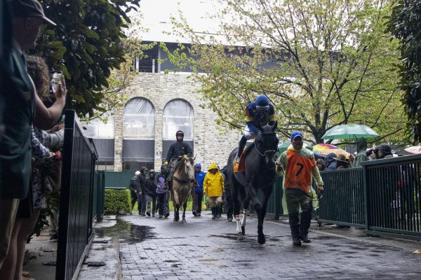 Riders enter the track during Spring Closing Day on Friday, April 25, 2025, at Keeneland Racetrack in Lexington, Kentucky. Photo by Sydney Novack | Staff