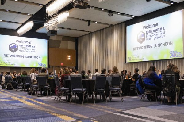 Attendees eat and converse during the 2025 Annual John P. Wyatt, MD Environment and Health Symposium on Tuesday, April 22, 2025, at Gatton Student Center in Lexington, Kentucky. Photo by Sydney Novack | Staff