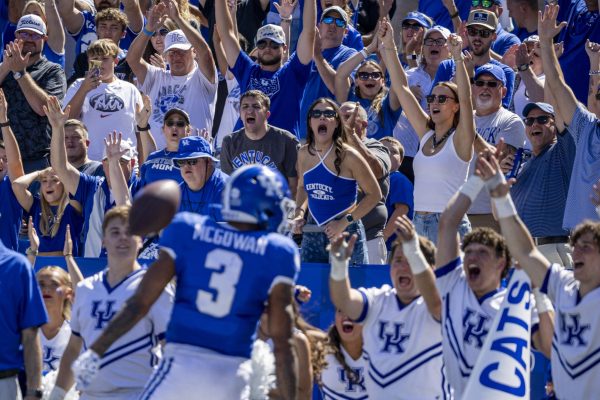 Kentucky Wildcats fans celebrate after running back Seth McGowan (3) scored a touchdown during the football game vs. Toledo on Saturday, Aug. 30, 2025, at Kroger Field in Lexington, Ky. Kentucky won 24-16. Photo by Christian Kantosky | Photo Editor