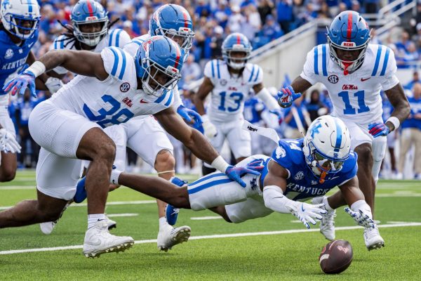 Kentucky Wildcats defensive back Ty Bryant (14) jumps to retrieve the ball during the football game against Ole Miss on Saturday, Sept. 6, 2025, at Kroger Field in Lexington, Ky. Photo by Christian Kantosky | Photo Editor
