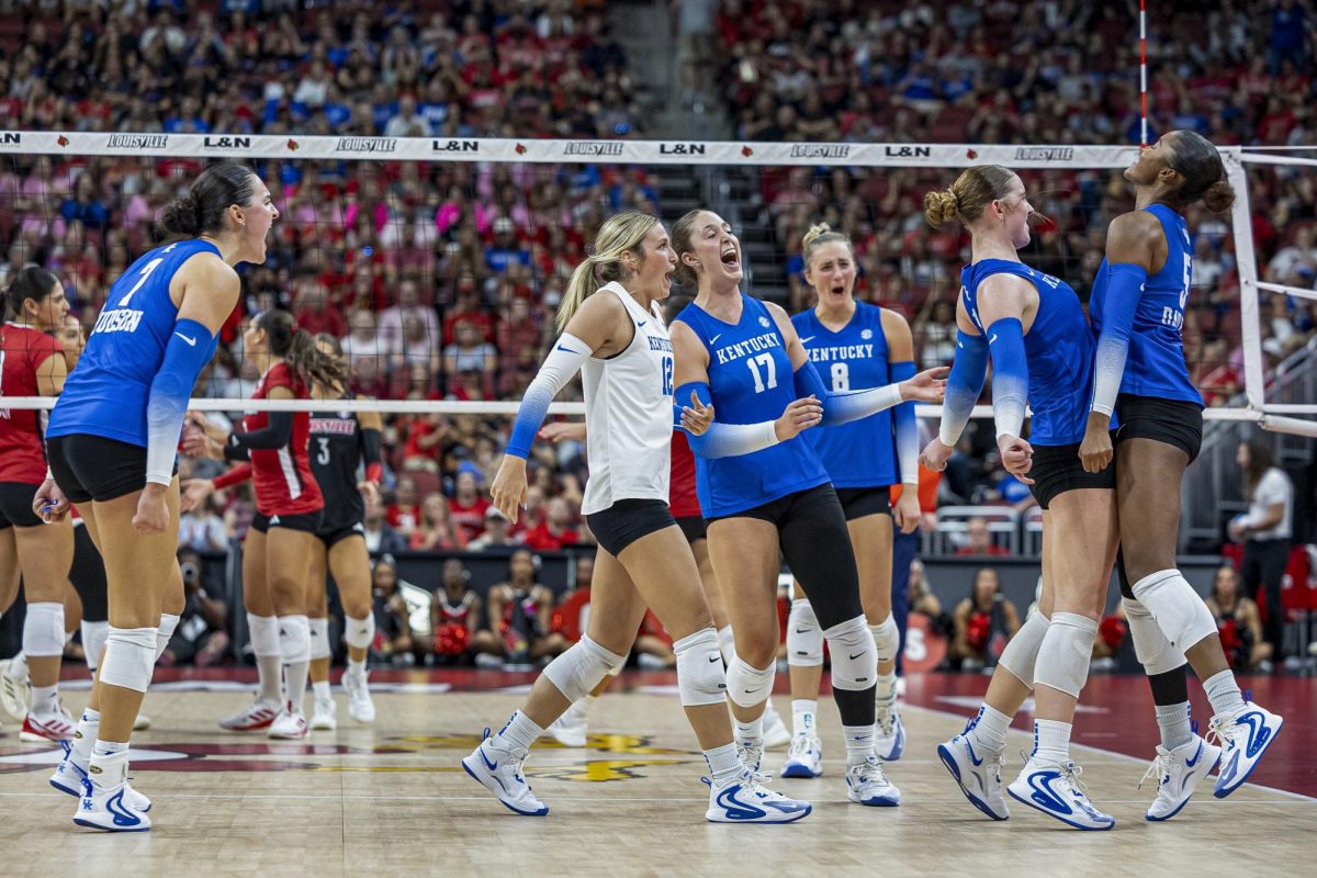 Kentucky celebrates after winning point during the volleyball game against Louisville Friday, Sept. 19, 2025, at KFC Yum! Center in Louisville, Ky. Kentucky won 3-2. Photo by Sydney Novack | Assistant Photo Editor