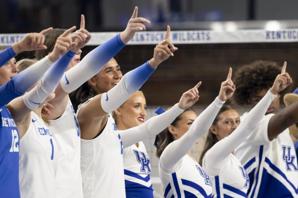The Kentucky Cheer and Volleyball team points while singing during the Kentucky against South Carolina women’s volleyball game on Wednesday, Sep. 24, 2025, at Historic Memorial Coliseum in Lexington, Ky. Kentucky won 3-0. Photo by Dayssia Jones | Staff
