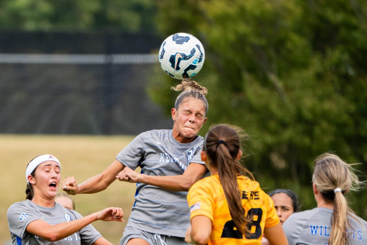 Kentucky Wildcats midfielder Sydni Fink (21) heads the ball during the soccer game against Missouri on Sunday, Sept. 21, 2025 at Wendell and Vickie Bell Soccer Complex in Lexington, Ky. Kentucky won 1-0. Photo by Will Luckett | Staff