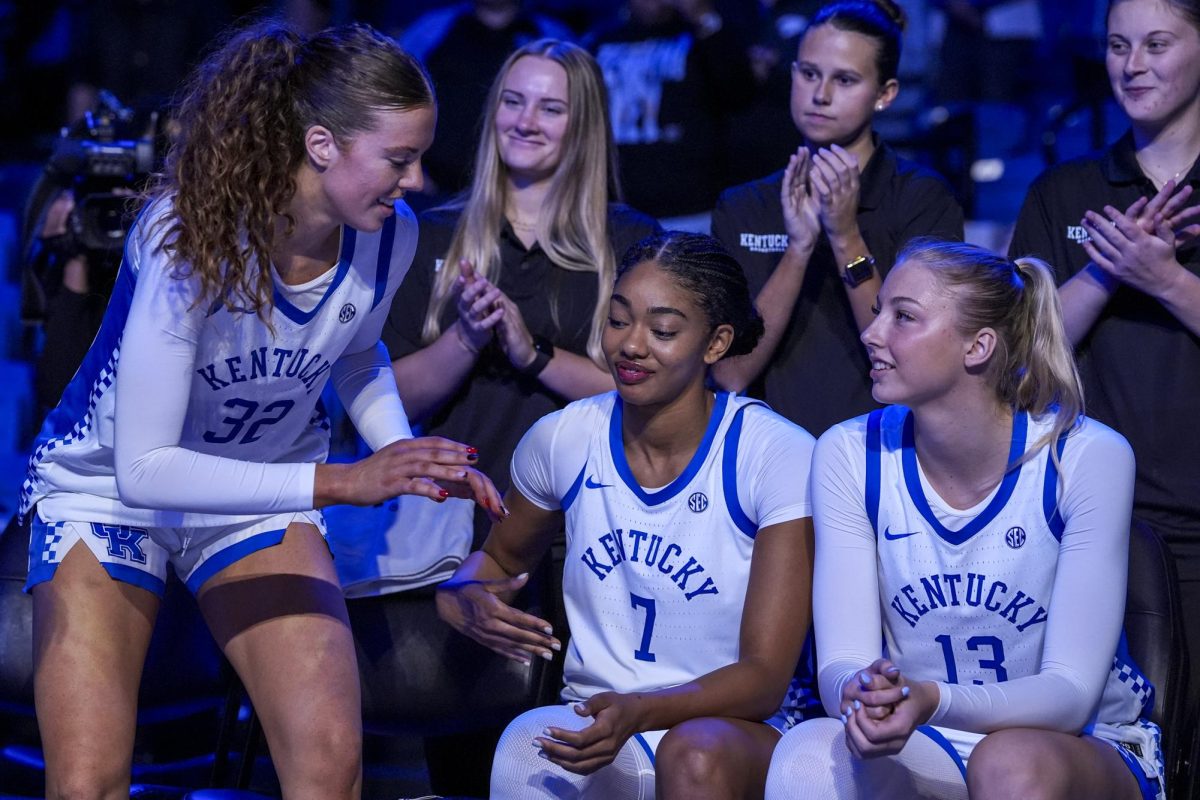 Kentucky forwards Amelia Hassett, left, high fives Teonni Key, center, before the women’s basketball game against Morehead State on Monday, Nov. 3, 2025, at Historic Memorial Coliseum in Lexington, Ky. Kentucky won 75-59. Photo by Christian Kantosky | Photo Editor