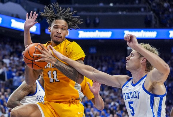 Kentucky Wildcats guard Collin Chandler (5) fouls Valparaiso Beacons forward Isaiah Barnes (11) during the men’s basketball game against Valparaiso on Friday, Nov. 7, 2025, at Rupp Arena in Lexington, Ky. Kentucky won 107-59. Photo by Christian Kantosky | Photo Editor