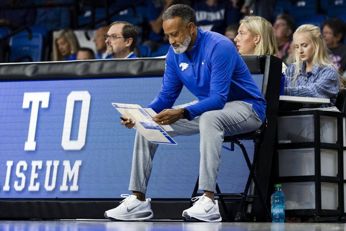 Kentucky head coach Kenny Brooks looks at paper before the women's basketball game against USC Upstate on Wednesday, Nov. 12, 2025, at Memorial Coliseum in Lexington, Ky. Kentucky won 90-30. Photo by Kate Bonafede | Staff
