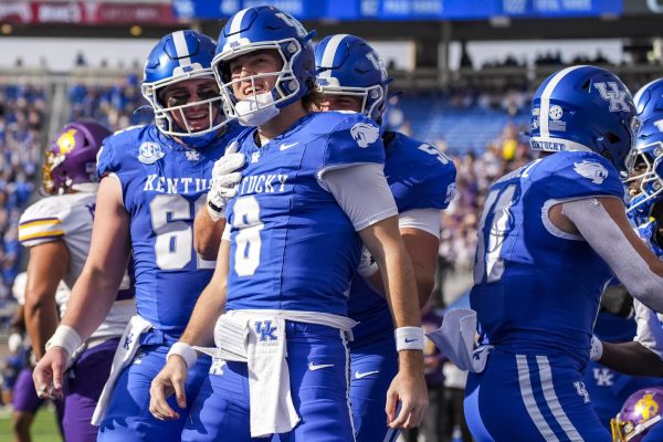 Kentucky Wildcats quarterback Cutter Boley celebrates after scoring a touchdown during the football game against Tennessee Tech on Saturday, Nov. 15, 2025, at Kroger Field in Lexington, Ky. Photo by Christian Kantosky | Photo Editor