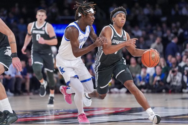 Kentucky Wildcats guard Denzel Aberdeen guards Michigan State Spartans guard Jeremy Fears Jr. during the basketball game against Michigan State on Tuesday, Nov. 18, 2025, at Madison Square Garden in New York City. Photo by Christian Kantosky | Photo Editor